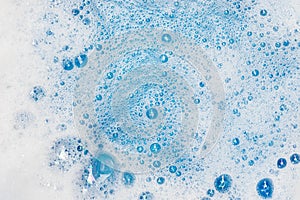 Soap foam with bubbles macro background