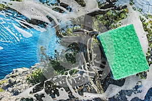 Soap foam on glass- cleaning of contaminated surfaces. Clean background- clipart photo