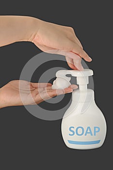 Soap foam on grey background