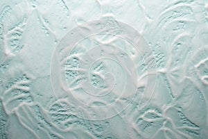 Soap and foam on a light background with place for text