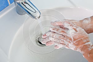 Soap hand washing photo