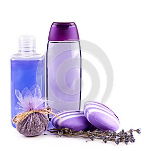 Soap, shampoo, lavender flowers and other hygiene products isolated on white . Free space for text