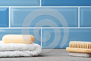 Soap and toiletries on shelf in blue bathroom