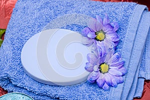 Soap, towel and flowers