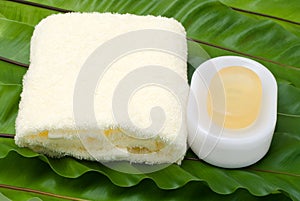 Soap and yellow towel