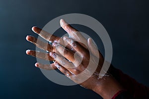 Soaped hands of a person - importance of washing hands during the coronavirus pandemic