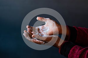 Soaped hands of a person - importance of washing hands during the coronavirus pandemic