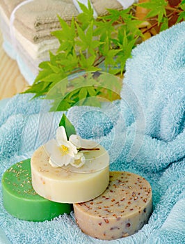 Soaps and towels in Peaceful Spa Setting