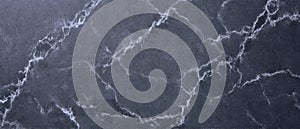 Soapstone dark gray surface with subtle veining and soft matte finish photo