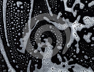 Soapy foam texture on black