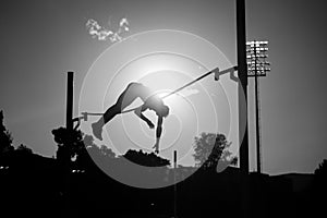 Soaring Heights: Capturing the Elegance of a Pole Vault Silhouette