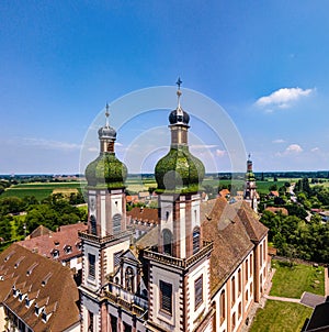 Soaring majestic church Saint Maurice in little french village E