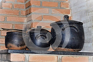Clay pots under the wood oven photo