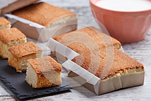 Sobaos pasiegos on an old wooden table