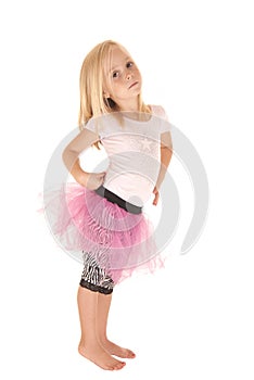 Sober blond preschool girl in pink tutu