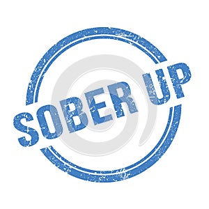 SOBER UP text written on blue grungy round stamp