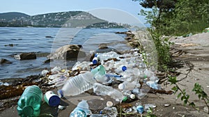 A sobering scene of plastic waste along a city's lakeside, raising questions about urban environmental practices and