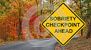 Sobriety Checkpoint Ahead Warning Sign - Autumn Background