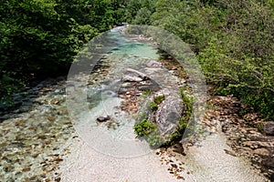 Soca - Emerald green water of Soca river in Bovec, Triglav National Park, Slovenia