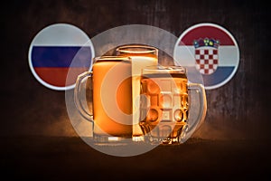 Soccer 2018. Creative concept. Beer glasses with beer on table ready to drink. Support your country with beer concept.