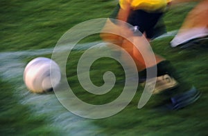Soccer Action In Time Lapse Motion Blur photo