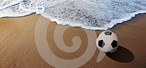 soccer ball on the beach