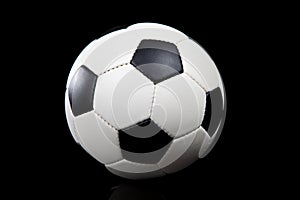 Soccer ball on a black background