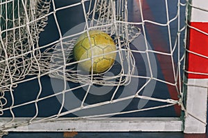 Soccer ball in gate