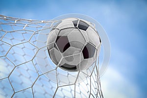 soccer ball on goal with net background