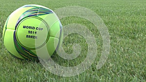 Soccer ball on grass field of the stadium