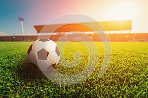 Soccer ball on grass in soccer stadium.