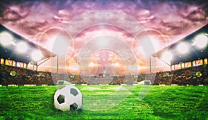 Soccer Ball On Green Field of football stadium for background