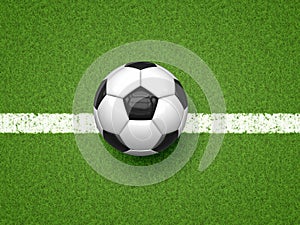 Soccer ball on green grass