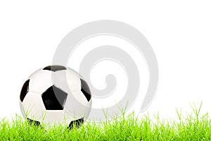 Soccer ball on green grass