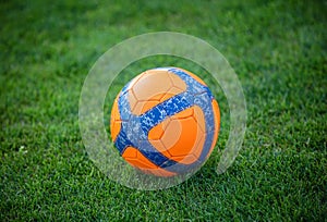 Soccer ball on green grass