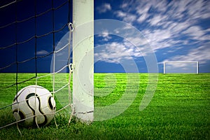 Soccer ball on green grass