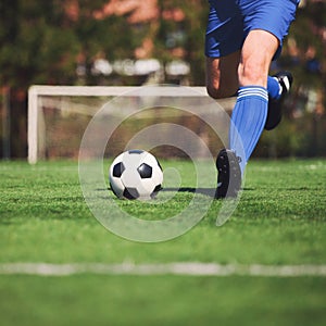 Soccer ball on green playground. Soccer concept