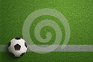 Soccer ball on green soccer field background