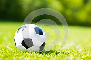 Soccer ball on ground grass stadium football game sport competition event championship match artificial green grass lawn