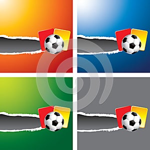 Soccer ball and penalty cards on ripped banners