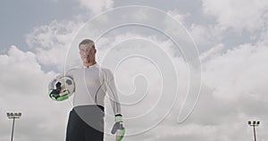 Soccer, ball and portrait of goalkeeper on field for game, practice match and competition outdoors. Sports mockup