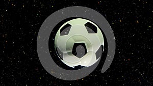 Soccer ball spins around its axis on a black space star background with multi-colored sparkles.