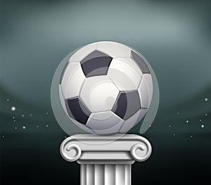 Soccer ball stands on a marble pillar pedestal