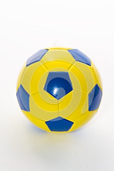 Soccer ball yellow-blue on a white background ,