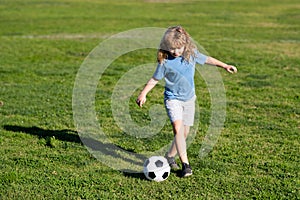 Soccer boy, child play football. Boy kicking football ball. Training for sport children.