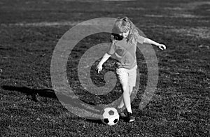 Soccer boy, child play football. Boy kicking football ball. Training for sport children.