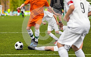 Soccer Duel. Young Running Players Competing for the Soccer Ball