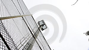 Soccer field behind the barbed wire of TurÃ³ de la Peira, Barcelona