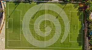 Soccer field in the countryside, aerial view from drone