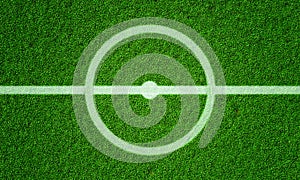 Soccer field in football stadium with line grass pattern and centerline circle. Sports background and athletic wallpaper concept.